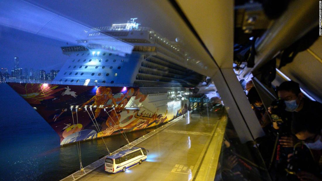 Photojournalists wearing face masks take photos of a bus carrying passengers after they disembarked from the World Dream cruise ship in Hong Kong on February 9. &lt;a href=&quot;https://www.cnn.com/2020/02/05/asia/coronavirus-cruise-quarantines-intl-hnk/index.html&quot; target=&quot;_blank&quot;&gt;More than 5,300 people were quarantined on two cruise ships&lt;/a&gt; off Hong Kong and Japan.